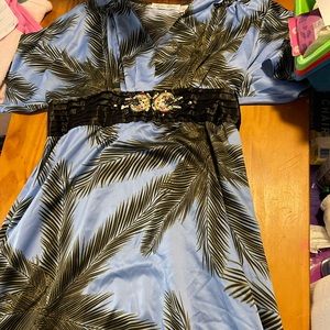 I’m selling a blue dress with palm trees on it